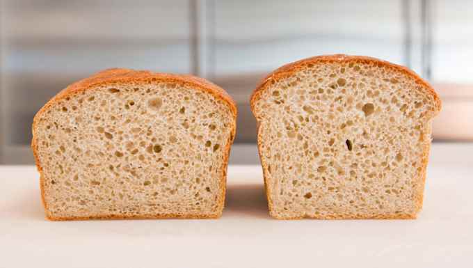 Two halved loaves of sandwich bread.